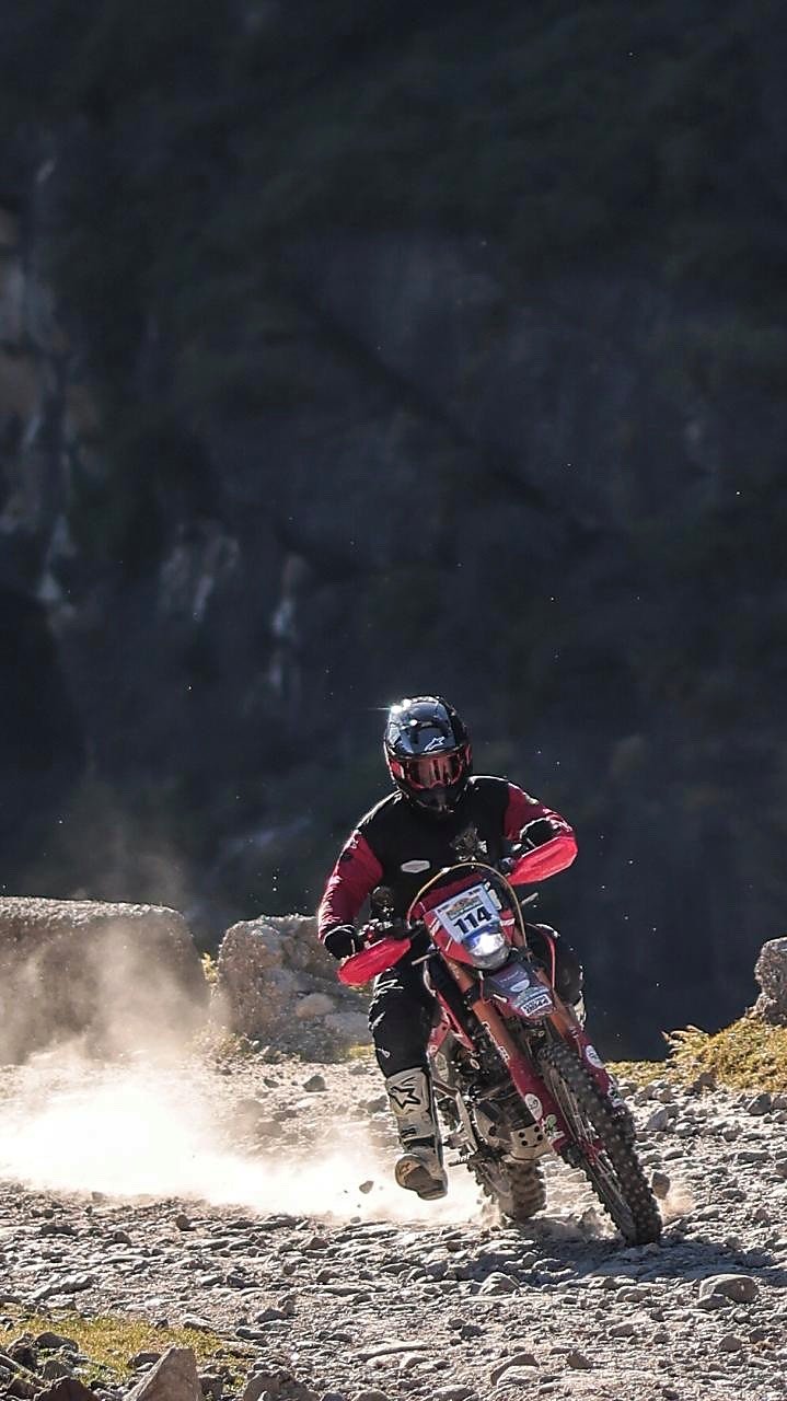 Leon Lhendup Wangdi racing through dust